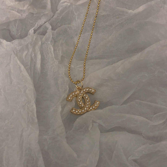 Gold CC Logo with Pearl Necklace