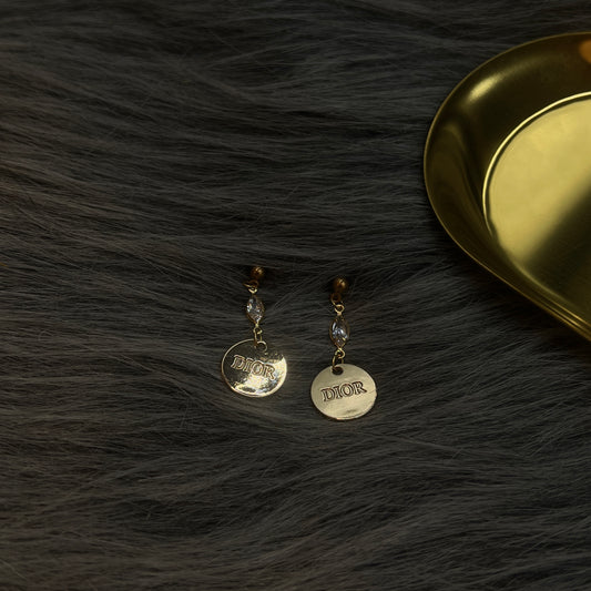 Gold D Logo Round Plate Pendant Earrings